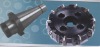 A class-nested indexable face milling cutter