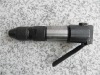 Air-operated hole digging tool