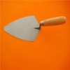 Bricklaying trowel with wood handle