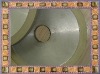 Diamond bruting wheel, ceramic bond