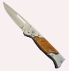 Folding knife with LED flashlight