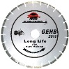 Hand-held high speed segmented diamond blade for long life cutting hard material