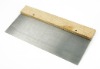 Putty knife with wooden handle