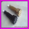 Rock drilling bits