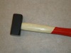 Stoning hammer with wooden handle