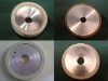 Vitrified diamond bruting wheel for natural diamond