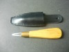 Woodworking knife with wooden handle packed in leather bag