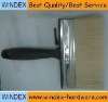 black handle wall brush