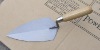 bricklaying trowel with wooden handle