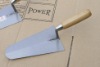 bricklaying trowel with wooden handle