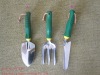 garden tool with green handle