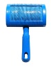 light blue plastic dog brush