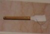 long wooden handle wall scraper