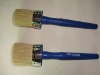natural bristle round brush with dark blue plastic handle