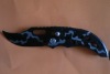 pocket knife with colored handle and in modern design and good quality