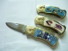 pocket knife with colored handle and in modern design and good quality