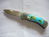 pocket knife with colored handle and in modern design and good quality