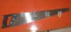 polished steel hand saw