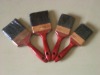 red plastic handle decorative brush