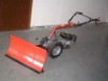 snow pusher with gasoline engine