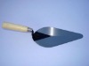 steel bricklaying trowel with wooden handle