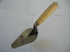 steel bricklaying trowel with wooden handle