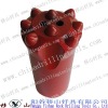 tapered rock drilling tool
