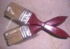 varnished red wood handle paint brush