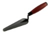 wooden handle bricklaying trowel